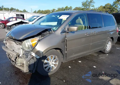 2010 Honda Odyssey Ex z USA, uszkodzony, nr VIN 5FNRL3H46AB016388